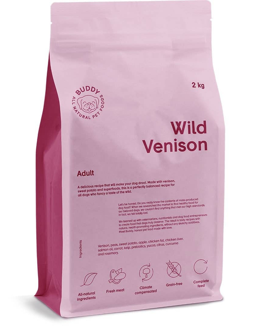 Pink bag of Buddy Foods Wild Venison dog food on a white background