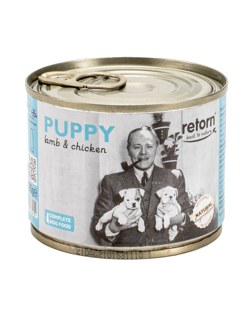 Can of puppy food with a vintage-style label featuring a man and two puppies.