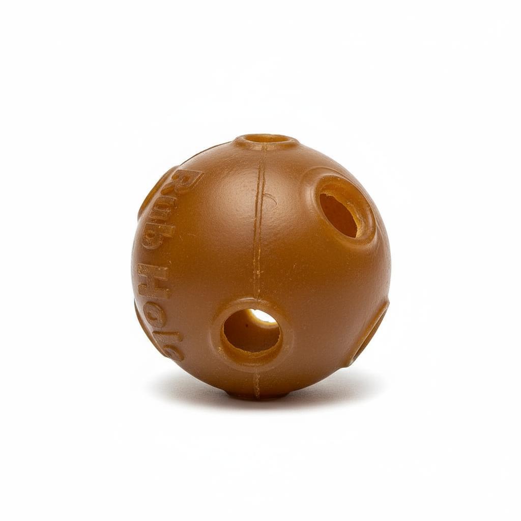 Brown dog toy with two holes on a white background
