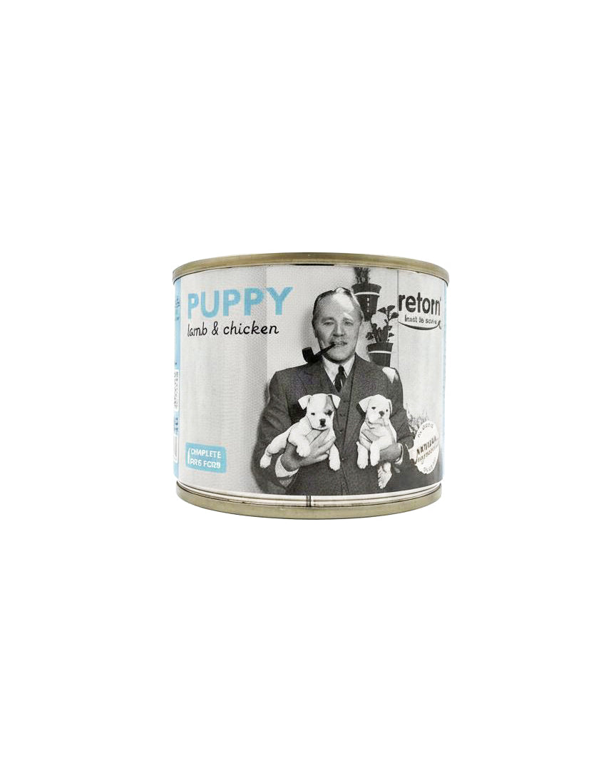 Can of Retoni Puppy food with a man holding puppies on the label